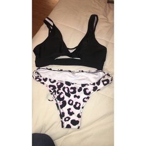 Two piece bathing suit (new )